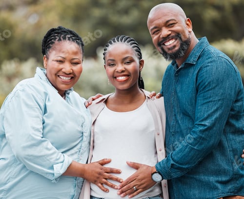 Preview: Shot of a mother and father celebrating their daughters pregnancy