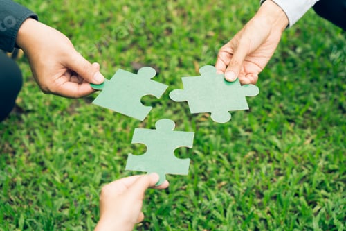 Preview: group of business people assembling jigsaw puzzle. The concept of cooperation