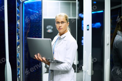 Preview: Female Scientist Posing with Supercomputer