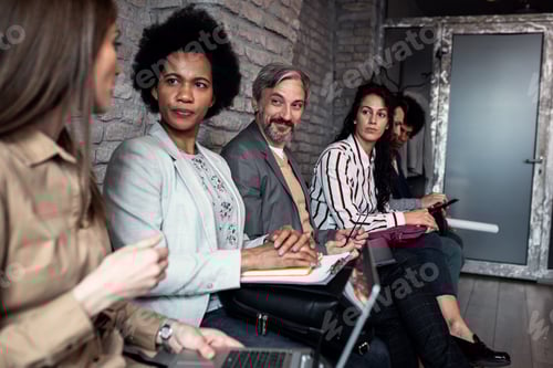 Preview: Business people waiting for job interview.