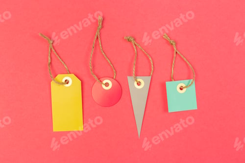 Preview: Different shapes of tags on a pink background ready for use in crafting or gifting