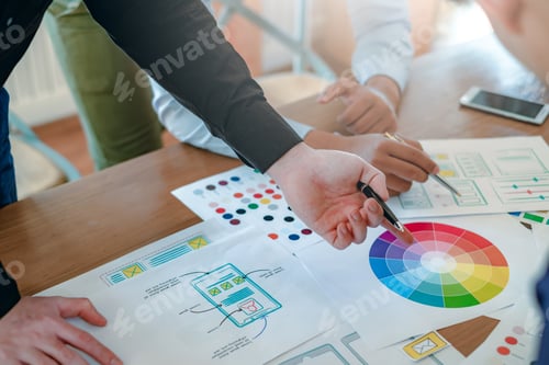 Preview: Creative web designers and applications work together in the office.
