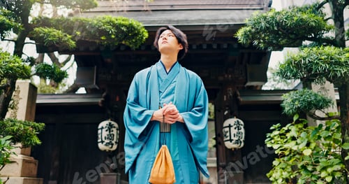 Preview: Kimono, thinking and low angle with Japanese man at temple for Shinto ceremony, fashion and prayer.