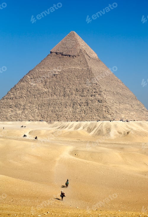 Preview: Explorers journeying across the sandy expanse before the majestic Great Pyramid of Giza.