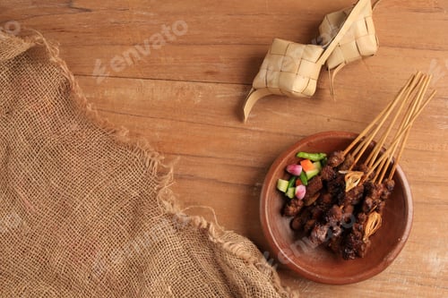 Preview: Skewers and Vegetables on Wooden Background