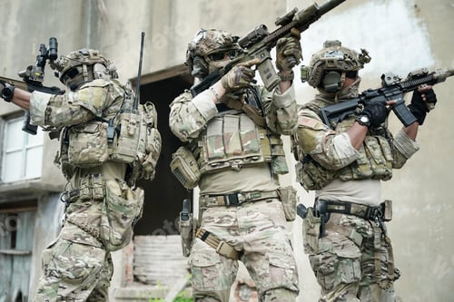 Preview: Soldier in full US MARSOC armed with assault rifle run through the abandoned building. Military