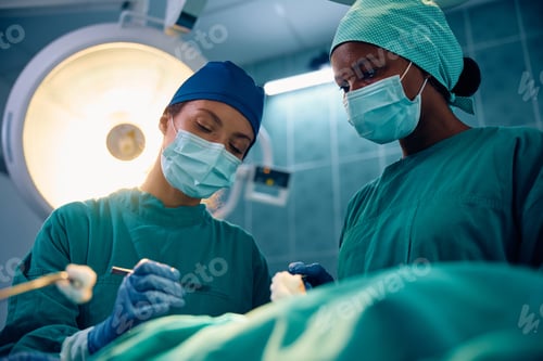 Preview: Surgical Team Working in Hospital Operating Room
