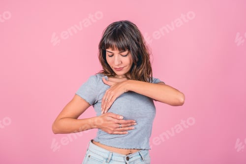 Preview: Woman doing a Breast Self-Exam (BSE).