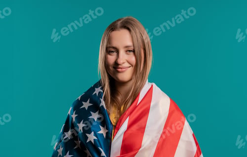 Preview: Happy woman with national USA flag on blue. American patriot 4th of July
