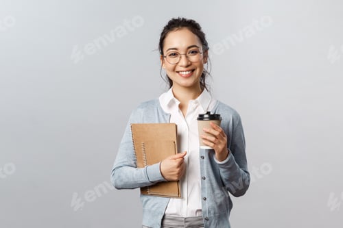 Preview: Education, teachers, university and schools concept. Good-looking smiling asian tutor, female with