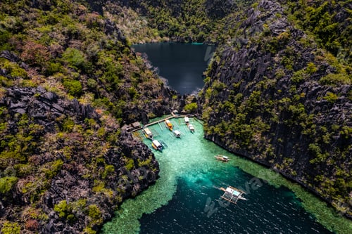 Preview: Aerial view of Twin Lagoon turquoise waters with a drone The Philippines Coron