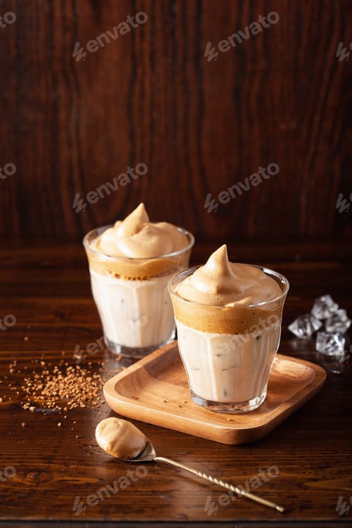 Preview: dalgona coffee in glass. trendy Instant coffee whipped with sugar and hot water