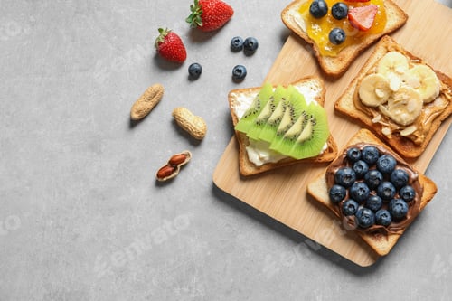 Preview: Flat lay composition with toast bread and different toppings on grey background