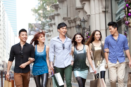 Preview: Excited young people go shopping on the street of Hong Kong
