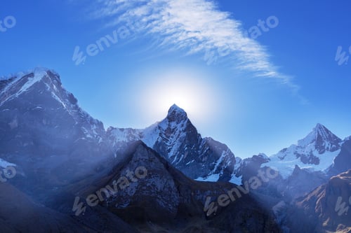 Preview: Snow Capped Mountain Range Against Blue Sky