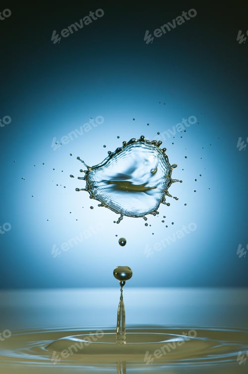 Preview: Splash of colorful liquid with high speed flash
