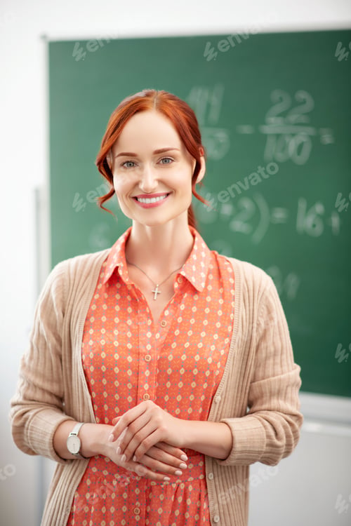Preview: Beaming teacher smiling before the start of school year