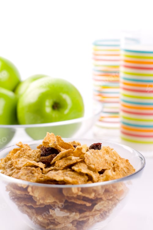Bowl of Cereal and Green Apples for Breakfast