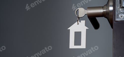 Preview: Open door at home with key in keyhole, new housing concept