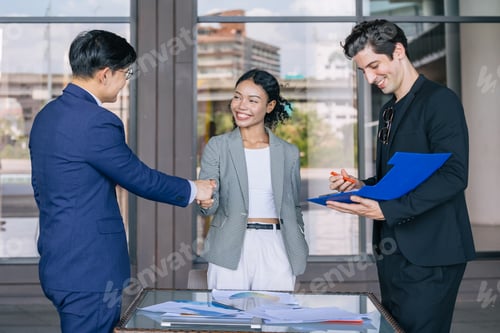 Preview: Group of business people meeting Hand shaking deal projects Agreement approved contract.
