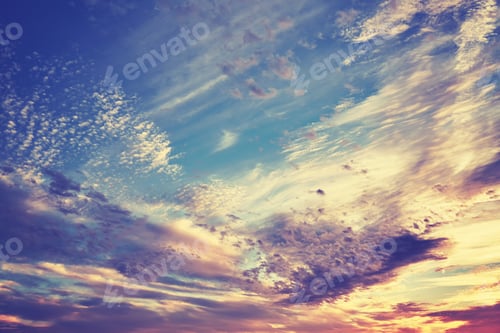 Preview: Color toned beautiful cloudscape at sunset