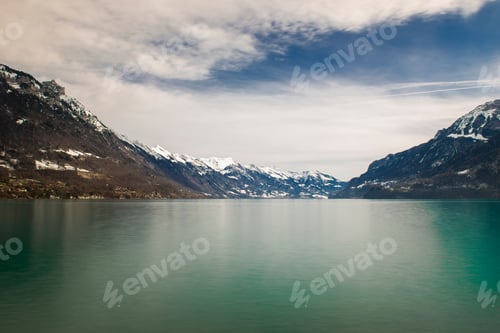 Snow Capped Mountains and Emerald Green Lake