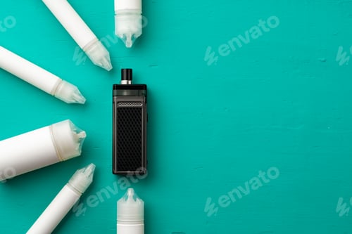 Preview: Vape juice bottles and electronic cigarette on blue background