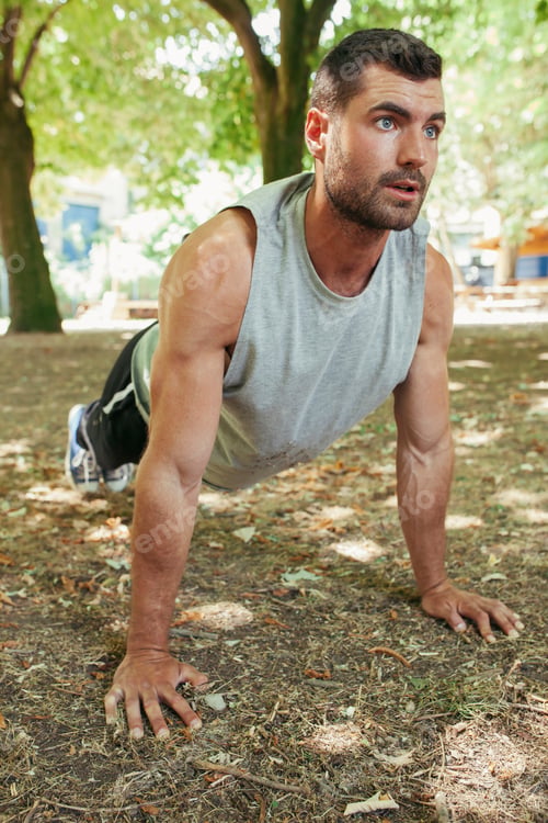 Preview: Sporty man training in park