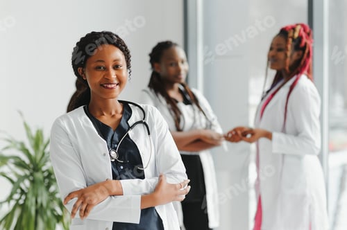 Preview: Portrait Of Medical Team Standing Outside Hospital