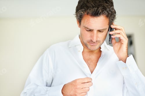 Preview: Man in Shirt Talking on Phone Indoors