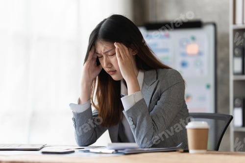 Preview: Stressed Asian business woman worry about marketing plan of this years. Account, Real Estate Agent