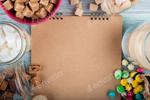 Preview: top view of a sketchbook with various types of sugar and candies in bowls and glass jars