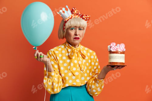Preview: Unhappy Grandmother Celebrating Birthday. Dissatisfied Lady Grumpy Expression