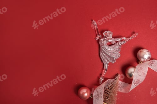 Preview: Decoration for Christmas, a small figurine of a ballerina with pink balls on red background