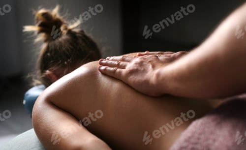 Preview: Massage Therapist Doing Shoulders Massage In Spa
