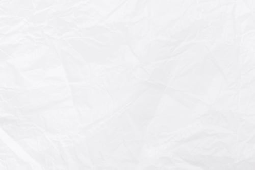 Preview: White crumpled wrapping paper texture close up.