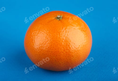 Preview: Ripe Mandarin Close-Up On A White Background. Tangerine Orange. Colorful Food And Drink Still Life