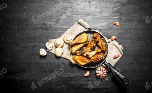 Preview: Chicken legs with mushrooms and garlic.