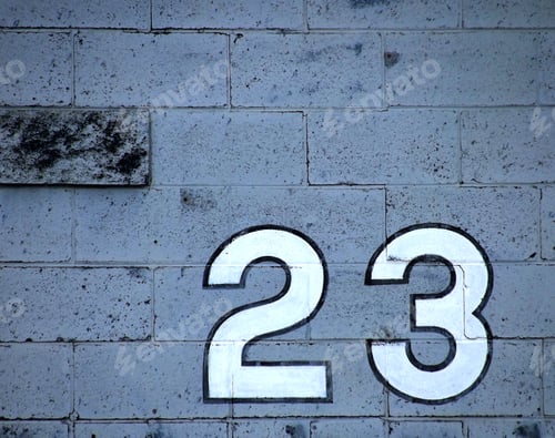Preview: Number 23 on a blue brick wall