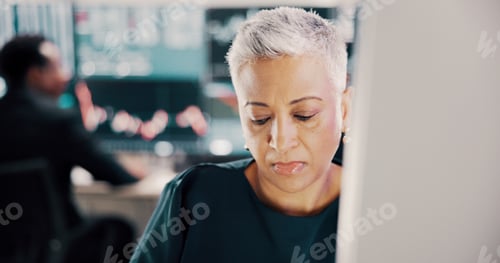 Preview: Mature woman, computer and trading on stock market with review, stats or charts in modern office. P