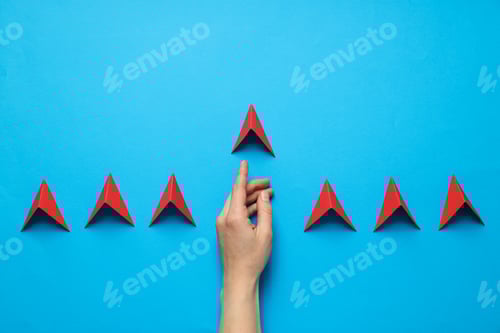Preview: Business, startup and sponsorship concept with arrows and hand on blue background