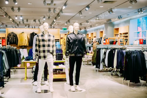 Preview: Fashion Display with Mannequins in Clothing Store