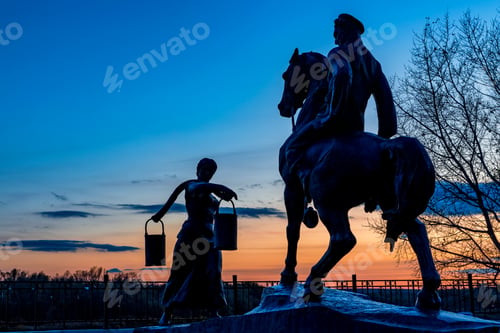 Preview: Aksinya and Grigory Melehov monument at sunset in Vyoshenskaya village, Russia