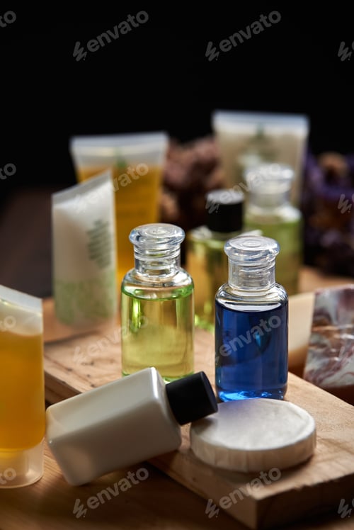 Preview: The bottle of shampoo and soap on the wooden board