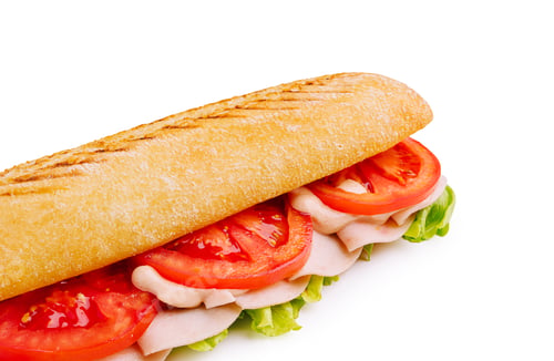 Preview: Fresh sandwich with lettuce, tomato, and turkey on a crusty roll