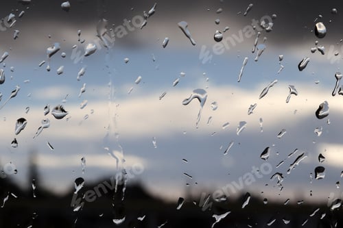 Preview: Abstract photo background. Rain drops on window.