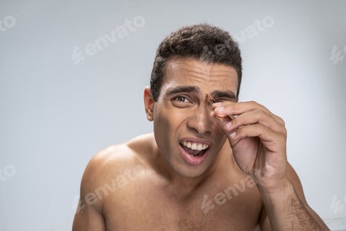 Preview: Man suffering during his painful cosmetological procedure