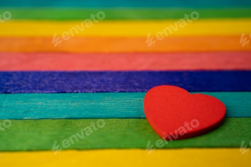 Preview: Red heart on rainbow color wooden, LGBT pride month celebrate annual in June