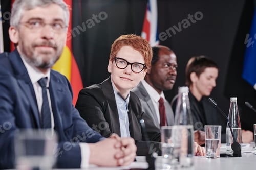 Preview: Group of politicians sitting at press conference