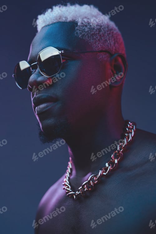 Preview: Nude african guy with white hairs against dark background